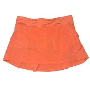 Lululemon Athletica Pace Rival mid-rise skirt in warm coral women’s size 10